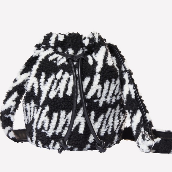 YITTY Handbags - NWT Yitty Major Label Sherpa Bucket Bag by Fabletics Iconic Black & White Logo